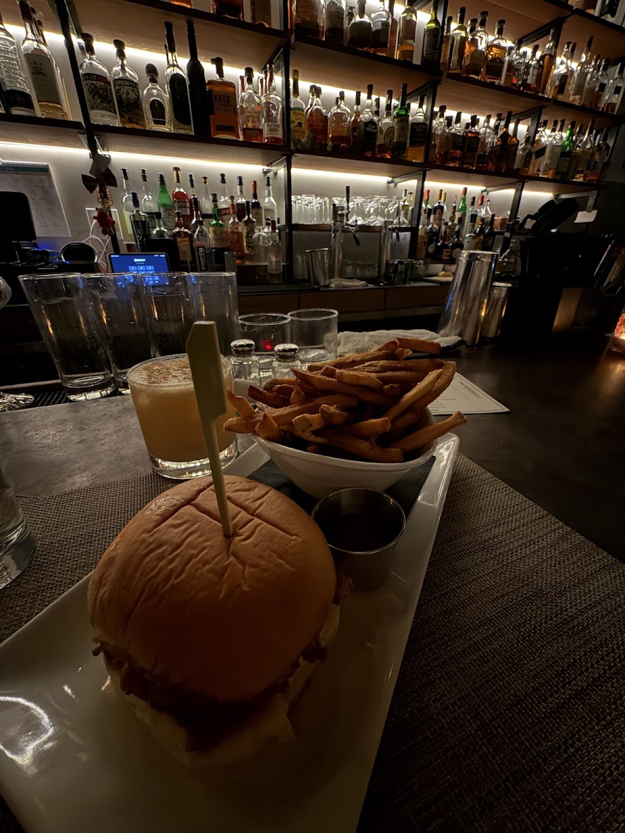 Club sandwich with fries at the bar